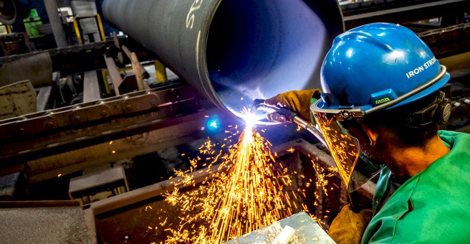 Cutting a sample for quality testing.