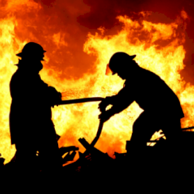 Fire Fighters battle a flame. Photo Source: iStock