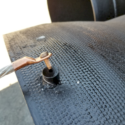 Close-up of Cable Bonding System on Ductile Iron Pipe.