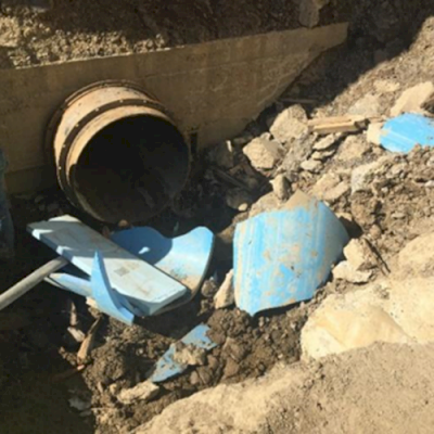 PVC pipe that has burst under pressure.