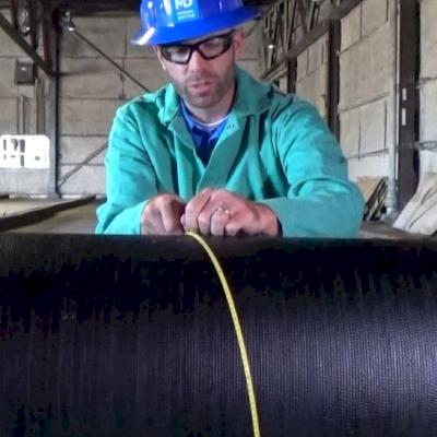 As shown here, slanted tape will result in an inaccurate measurement.