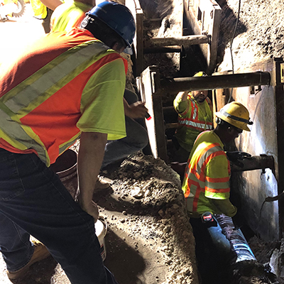 Ken Rickvalsky, McWane Ductile National Product Engineer (left) is on site to ensure proper installation of DI pipe in Miramar, FL.