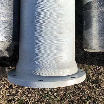 Close-up of the white paint, per Newport News specification, applied by others for the aerial crossing.