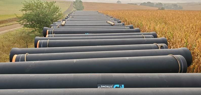 Ductile iron pipe with protective zinc coating and asphaltic topcoat awaits installation in South Dakota.