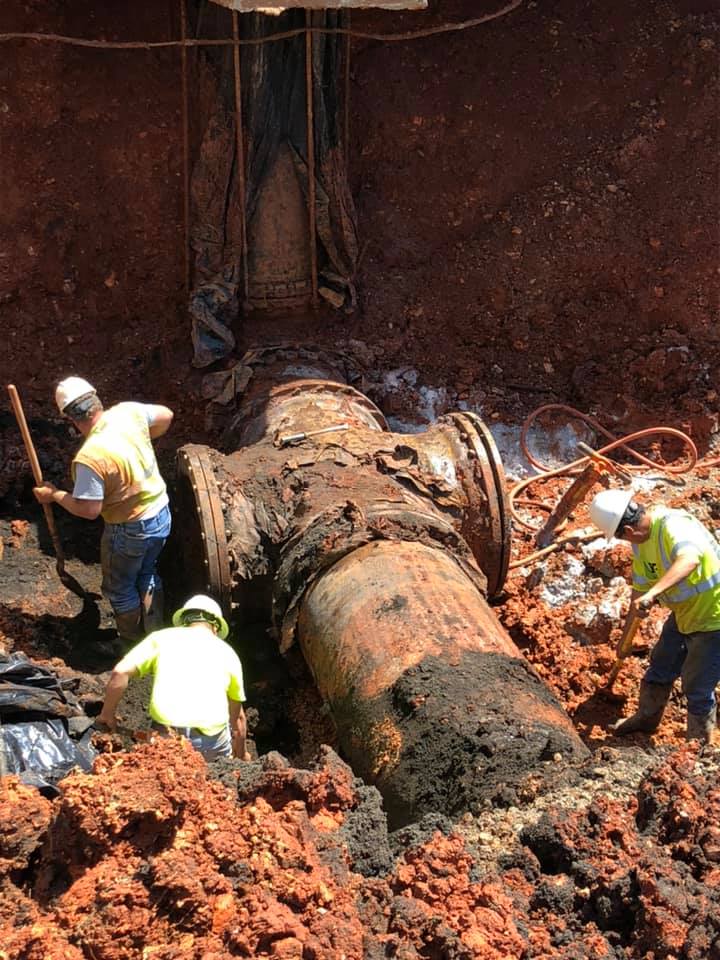 Seven Valleys Concrete Crewmen uncover a 36-inch MJ Cross.