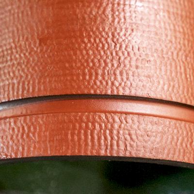 This pipe has grooved pipe ends, which are connected using segmented mechanical couplings and bolts.