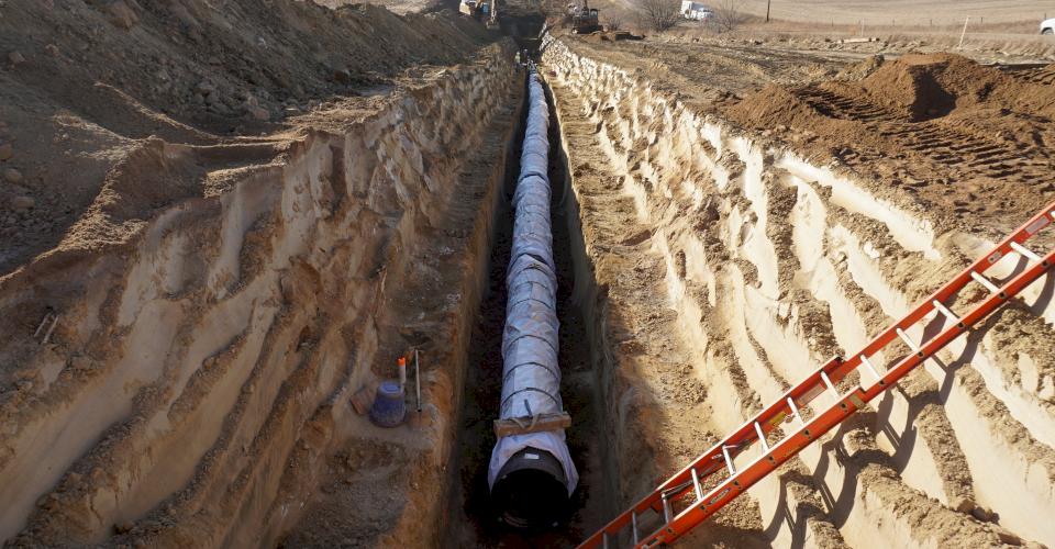 Ductile iron pipe installed with V-Bio® Enhanced Polyethylene Encasement.