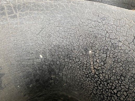 Example of surface crazing (checkerboard or cobweb pattern).