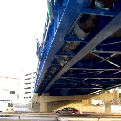 18" restrained joint pipe on a bridge over a highway, Feb. 2004.