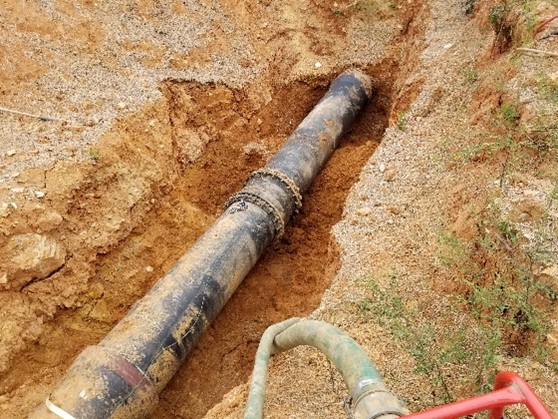 Pipe installed in ditch.