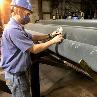 Wall thickness inspection/confirmation by McWane Ductile QA personnel.