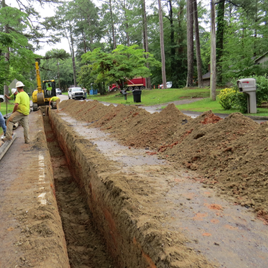 Trench sizing and content is based on need and pipe material used.