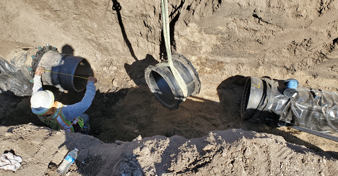 Measuring spool piece to begin finalization of a one-sleeve joint repair/gasket replacement.