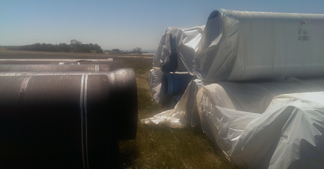 PVC protected with factory-applied wrapping in Sacramento, California circa 2014. DI pipe, no sweat, no concerns.