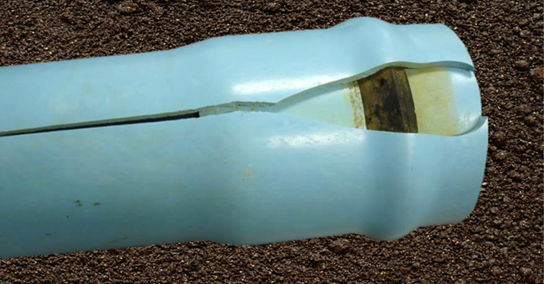 Typical splitting of PVC pipe bell from over-insertion of PVC spigot end during joint assembly.