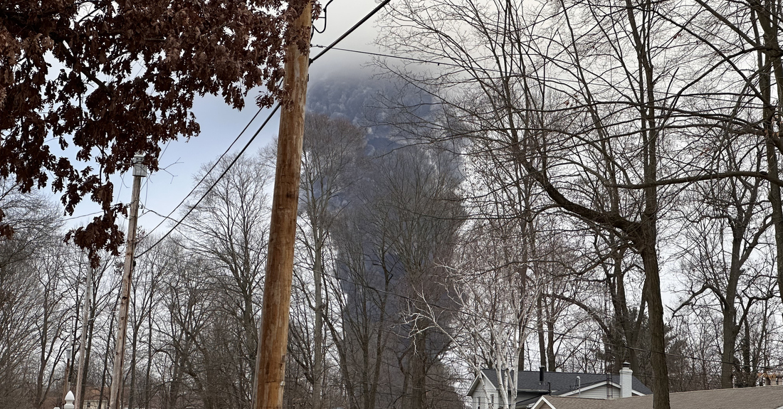 East Palestine, Ohio - Circa 2/23 - A train car derailment resulted in burning cars and the release of vinyl chloride in the air. Contamination of nearby water sources was also a major concern. Image Source: iStock