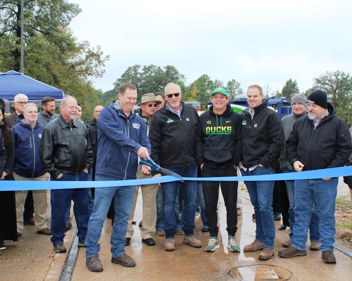 Plant Manager Joe Holzbauer wielded the giant shears and ushered in a new era for Tyler Pipe and its Blacklands Railroad partner